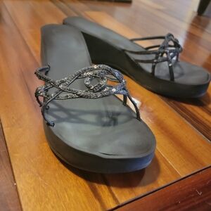 Chic Black Women's Sandals with Intricate Straps